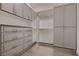 Custom walk-in closet with built-in shelving and ample storage space at 11831 Saverio Ave, Las Vegas, NV 89138