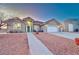 Charming single-story home with a two-car garage and a separate storage building at 1464 Barlow Ave, Moapa, NV 89025