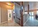 Hallway with wood-look tile flooring leading to other rooms in the house at 1464 Barlow Ave, Moapa, NV 89025