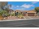 Charming single-story home with a well-maintained yard and a two-car garage at 1564 Fieldbrook St, Henderson, NV 89052