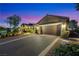 Beautiful single-story home featuring a two-car garage, modern driveway, and well-manicured landscaping at 1564 Fieldbrook St, Henderson, NV 89052