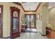 Welcoming foyer with decorative ceiling beams, tile flooring, and a charming entryway at 1564 Fieldbrook St, Henderson, NV 89052