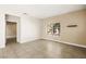 Bright living room with tile flooring and neutral wall color at 1851 Hillpointe Rd # 2922, Henderson, NV 89074