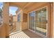 Patio view shows sliding glass door that leads to the interior living space at 1851 Hillpointe Rd # 2922, Henderson, NV 89074