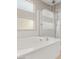 Modern bathroom featuring a soaking tub and separate glass enclosed shower at 2153 Havensight Ln, Henderson, NV 89052