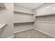 Walk-in closet with built-in shelving and bars at 2153 Havensight Ln, Henderson, NV 89052