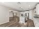 Open-concept kitchen flows into the living area, complete with island and stainless appliances at 2153 Havensight Ln, Henderson, NV 89052