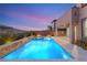 Exterior view of the backyard featuring a custom pool and elevated spa at 2153 Havensight Ln, Henderson, NV 89052