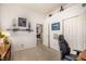 Bedroom featuring neutral carpet, white walls, decorative shelving, and a closet at 2329 Quartz Peak St, Las Vegas, NV 89134