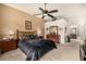 Large main bedroom with ceiling fan and furniture at 2329 Quartz Peak St, Las Vegas, NV 89134