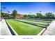 Outdoor bocce ball court area with multiple lanes and greenery at 2554 Corvus St, Henderson, NV 89044