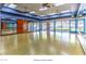 Spacious dance studio with mirrored walls, wood flooring and natural light, perfect for fitness and dance activities at 2554 Corvus St, Henderson, NV 89044