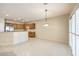 Kitchen eat-in area features tile flooring, stainless steel appliances, and direct kitchen access at 2554 Corvus St, Henderson, NV 89044