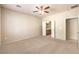 Main bedroom with carpeted floors and access to the ensuite bathroom at 2554 Corvus St, Henderson, NV 89044