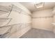 Spacious walk-in closet features ample wire shelving for optimal storage at 2554 Corvus St, Henderson, NV 89044