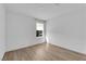 Bright bedroom featuring sleek hardwood floors and minimalist modern design at 2607 Aversa St, Henderson, NV 89044