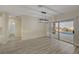 Light-filled dining area with sleek light fixture and access to the outdoor pool and backyard at 2820 Thunder Bay Ave, Henderson, NV 89052