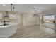 Dining area with access to kitchen and sliding doors to outdoor pool and backyard at 2820 Thunder Bay Ave, Henderson, NV 89052