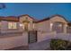 Inviting home exterior with a gated courtyard, desert landscaping, and a tile roof at 2820 Thunder Bay Ave, Henderson, NV 89052