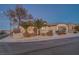 Attractive single-story home with desert landscaping, stone accents, and an attached two-car garage at 2820 Thunder Bay Ave, Henderson, NV 89052