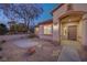 Beautiful home entrance with desert landscaping, a stone walkway, and warm exterior lighting at 2820 Thunder Bay Ave, Henderson, NV 89052