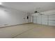 Spacious garage with epoxy floors, white walls, and an automatic door at 2820 Thunder Bay Ave, Henderson, NV 89052