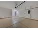 Bright, clean garage featuring epoxy floors, white walls, and ample space at 2820 Thunder Bay Ave, Henderson, NV 89052