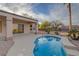 A refreshing backyard pool, surrounded by beautiful landscaping and a patio at 2820 Thunder Bay Ave, Henderson, NV 89052