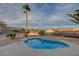 A refreshing backyard pool is surrounded by desert landscaping, offering a private oasis for relaxation and recreation at 2820 Thunder Bay Ave, Henderson, NV 89052