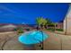 Relaxing pool area with shimmering water, palm trees, and modern design elements, perfect for leisure at 2820 Thunder Bay Ave, Henderson, NV 89052