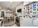 Well-lit kitchen features stainless steel appliances and opens to the dining area at 3150 Soft Breezes Dr # 2022, Las Vegas, NV 89128