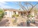 Desert landscaping and covered patio area at 379 Turquoise Ct, Boulder City, NV 89005