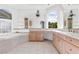 Bright bathroom features tile flooring, a soaking tub, and light wood cabinets at 379 Turquoise Ct, Boulder City, NV 89005