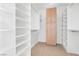 Walk-in closet with custom shelving and ample storage at 379 Turquoise Ct, Boulder City, NV 89005