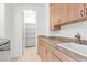 Functional laundry room features granite countertops and ample storage space at 379 Turquoise Ct, Boulder City, NV 89005