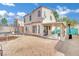 Home exterior with a trampoline, patio seating under shade structure and desert landscaping at 3916 Rhine Way, Las Vegas, NV 89108