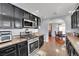 Modern kitchen with granite countertops and stainless steel appliances at 3916 Rhine Way, Las Vegas, NV 89108