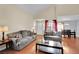 Comfortable living room featuring wood floors and an open floor plan at 3916 Rhine Way, Las Vegas, NV 89108