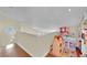 Bright loft area with hardwood floors and octagon window, perfect for a playroom at 3916 Rhine Way, Las Vegas, NV 89108