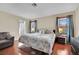 Serene main bedroom with a comfortable bed, neutral decor, and a peaceful ambiance at 3916 Rhine Way, Las Vegas, NV 89108