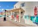 Back patio featuring a built-in grill and seating area under a pergola with string lights at 3916 Rhine Way, Las Vegas, NV 89108