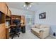 This bedroom showcases a built-in desk and a cozy seating area, perfect for work and relaxation at 4075 E Oquendo Rd, Las Vegas, NV 89120