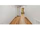 Hallway with tiled flooring leading to the kitchen with stainless steel appliances at 4075 E Oquendo Rd, Las Vegas, NV 89120