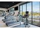 Well-equipped gym with state-of-the-art treadmills and fitness equipment overlooking scenic outdoors at 4220 E Brusca Way, Pahrump, NV 89061