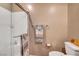 Clean bathroom features a glass-enclosed shower and towel rack at 4566 Ganier Ct # 1125, North Las Vegas, NV 89031