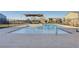 Community pool with stainless steel ladders and an additional play structure visible at 4566 Ganier Ct # 1125, North Las Vegas, NV 89031