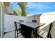 Outdoor patio with table and chairs, ideal for dining or entertaining at 4566 Ganier Ct # 1125, North Las Vegas, NV 89031