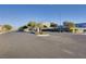 Neighborhood view showing the community entrance, landscaping, and signage at 4566 Ganier Ct # 1125, North Las Vegas, NV 89031