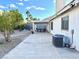 Backyard patio with shade cover and well-maintained landscaping creates an ideal space for outdoor entertaining at 470 Como Ct, Henderson, NV 89015