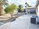 A backyard featuring a mix of gravel and concrete areas at 470 Como Ct, Henderson, NV 89015